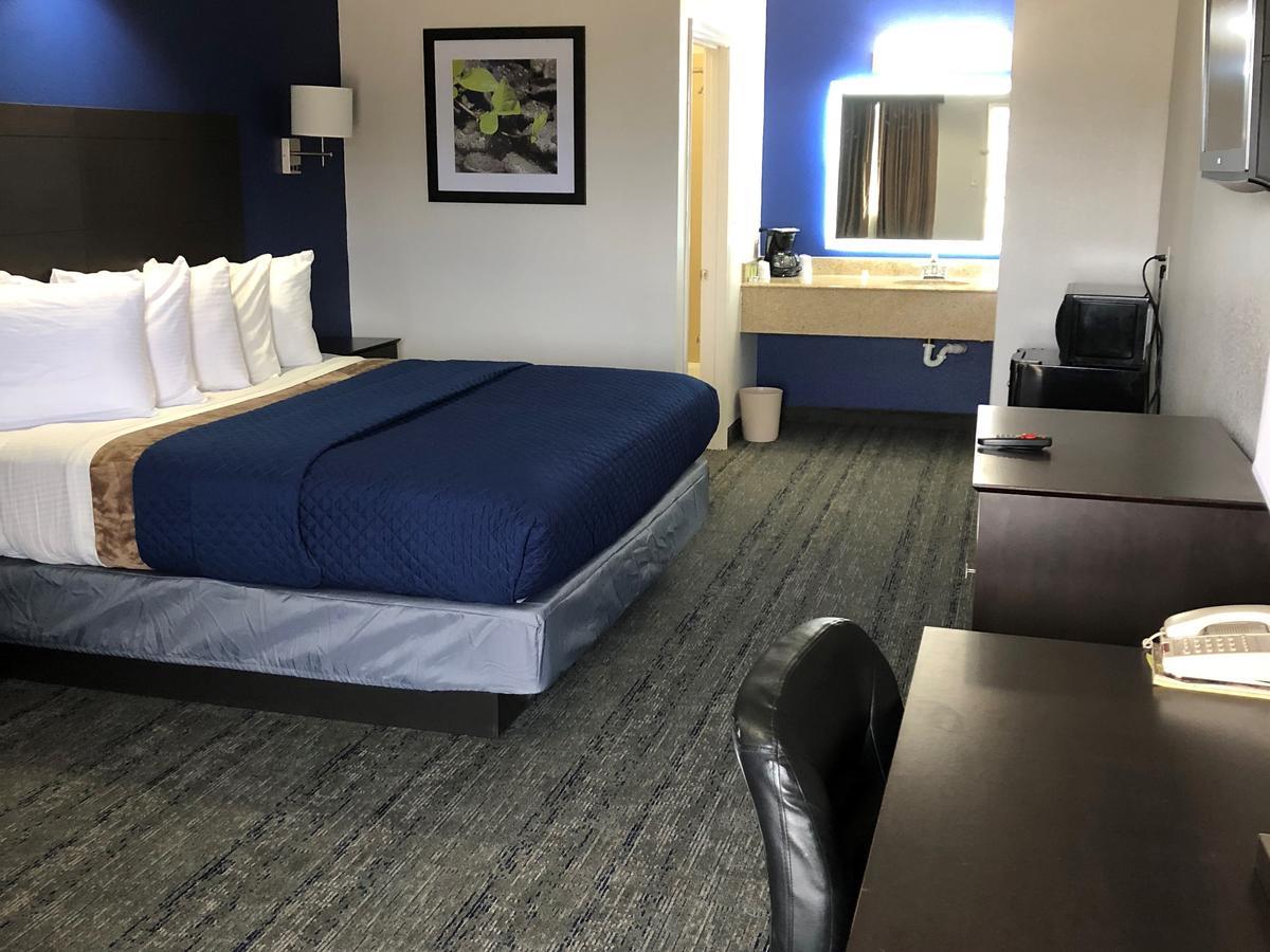 Executive Inn And Suites Joaquin Eksteriør billede