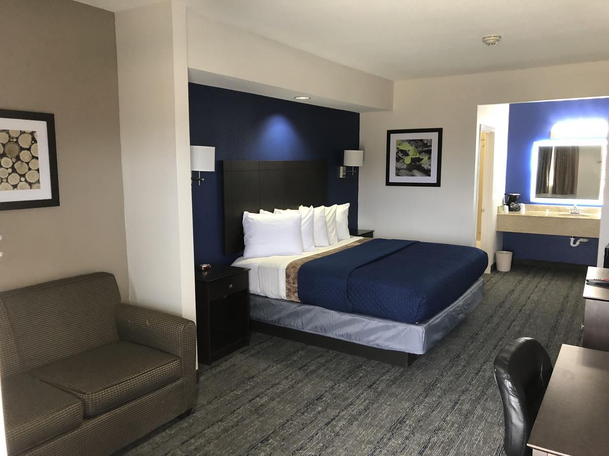 Executive Inn And Suites Joaquin Eksteriør billede