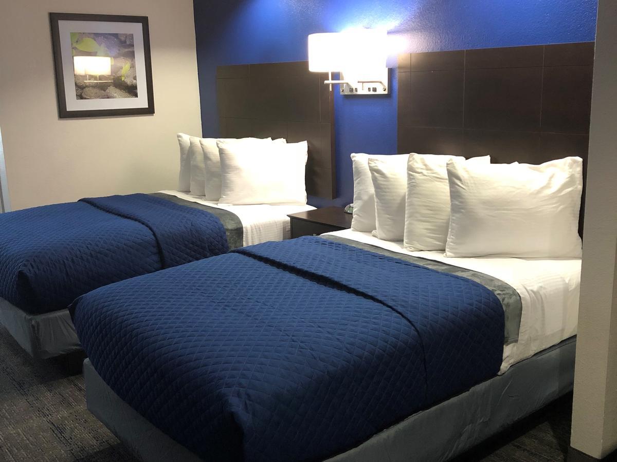 Executive Inn And Suites Joaquin Eksteriør billede