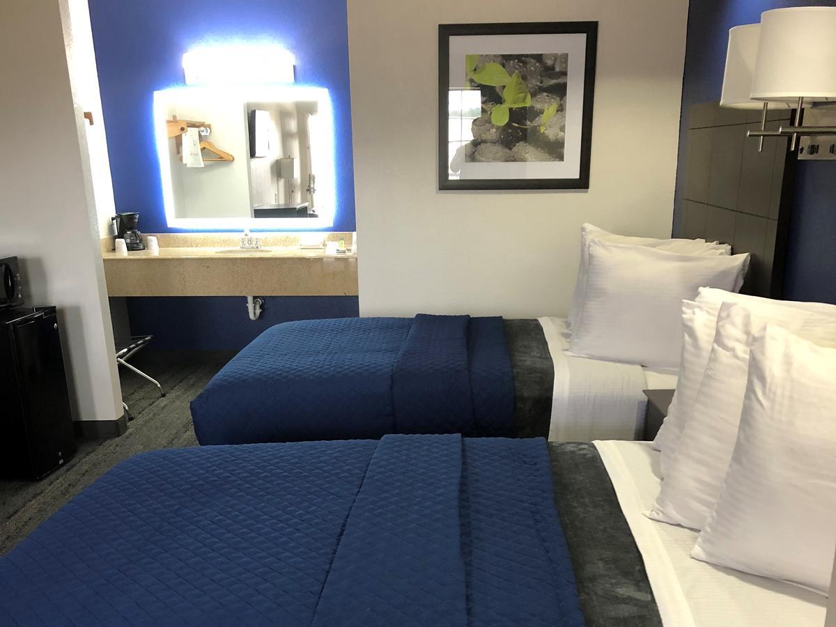 Executive Inn And Suites Joaquin Eksteriør billede