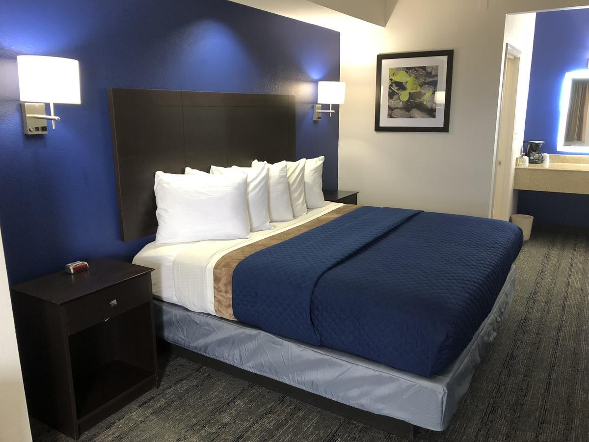Executive Inn And Suites Joaquin Eksteriør billede