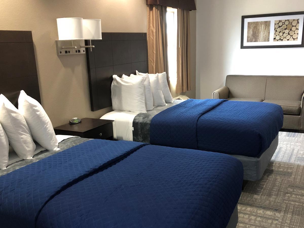 Executive Inn And Suites Joaquin Eksteriør billede