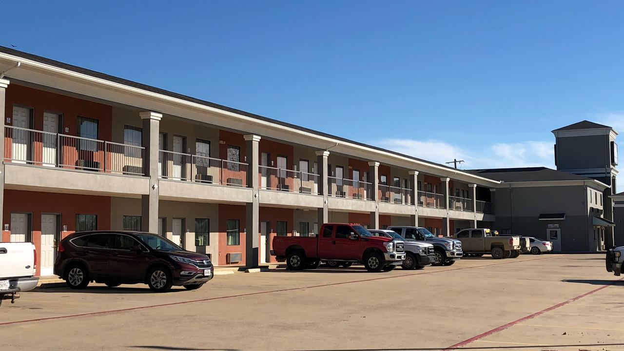 Executive Inn And Suites Joaquin Eksteriør billede